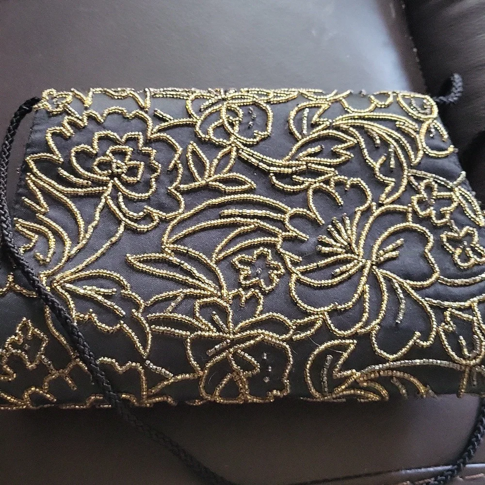Carla Marchi Elegant Black and Gold Floral Clutch